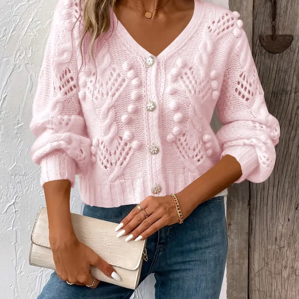 Woman’s pink cardigan size small